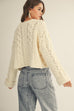 Soft Twisted Ribbed Half Buttons Down Sweater